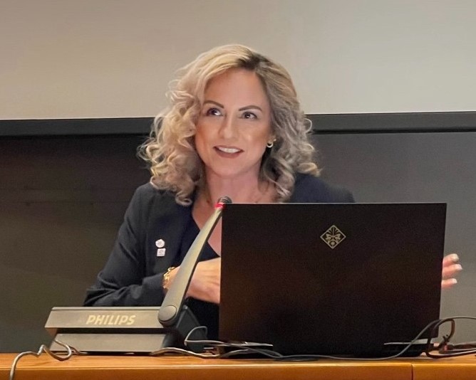 Laspidou Apr 2023 green background cropped